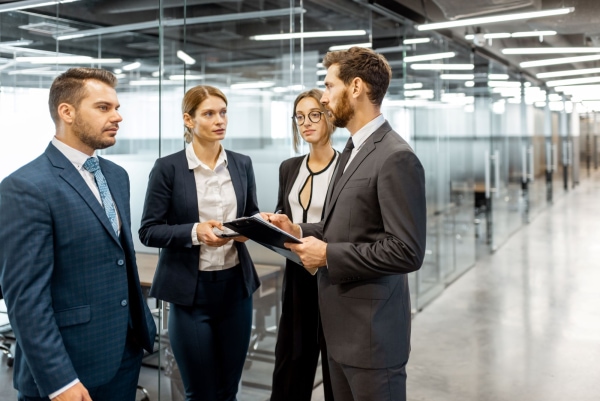 a group of people standing in a room